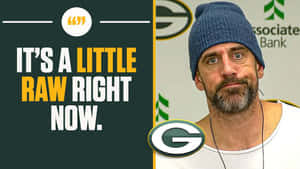 戴藍色冷帽、穿白恤衫嘅男人，喺 Green Bay Packers 標誌旁邊，附有引文。