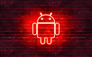 夜晚潮濕的磚牆上，霓虹燈Android標誌發出紅光。 — 凌志標誌 GIF 壁紙
