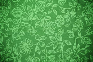 帶有白色花卉刺繡圖案嘅綠色布料。 — 綠色美學 壁紙