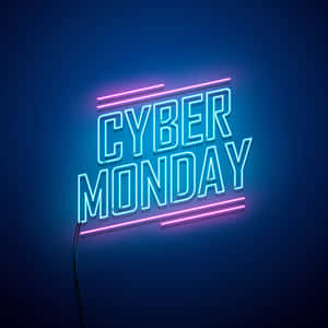 霓虹燈牌在深色牆壁上以藍色和粉紅色燈光顯示cyber monday。 — 霓虹 壁紙
