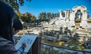 小孩在秋季公園畫古代石頭遺跡 — 建築 壁紙