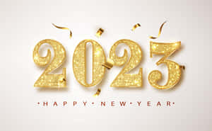 金色2023，附紙屑和Happy New Year文字，用於慶祝。