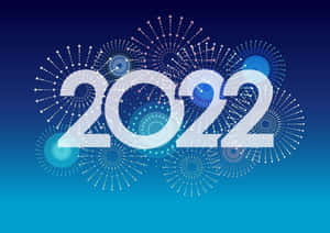 在漸變藍色背景上，帶有藍色煙火和圓形圖案的粗體白色 2022 文字。