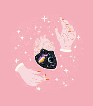 兩隻手捧著一個包含星空銀河和月亮的心形。