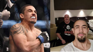 MMA戰士在八角籠中慶祝並在酒店房間自拍中微笑。 — 搏擊會 GIF 壁紙