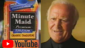 復古 Minute Maid 果汁盒和穿著深色西裝微笑的男子。