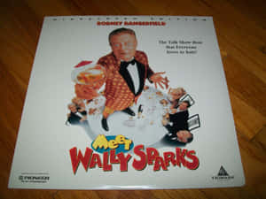 《Meet Wally Sparks》電影海報，羅德尼·丹傑菲爾德在餐桌旁手持雞尾酒。