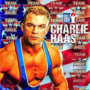 摔角手 Charlie Haas 穿著藍色短褲，站在愛國的 Team Angle 背景前。 — 冠軍 壁紙