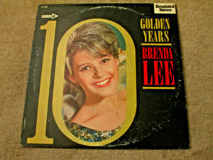復古黑膠唱片封面，金色數字十內有微笑的Brenda Lee。 — 復古gif 壁紙