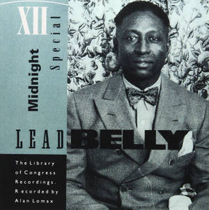 Lead Belly 穿著西裝和領結，來自美國國會圖書館錄音的復古照片。