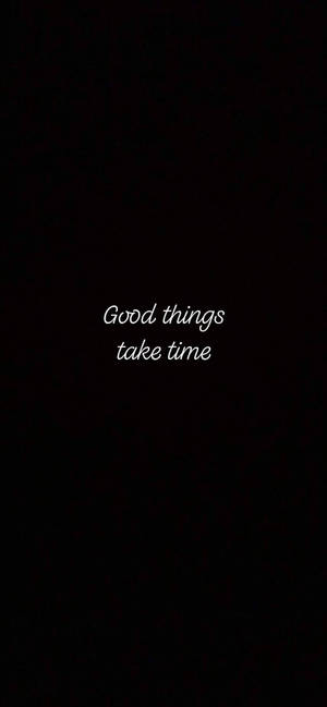 黑色背景，白色草書文字寫著「Good things take time」