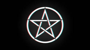 霓虹五角星符號在黑色背景上發光。