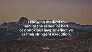 黃昏時分的山脈，上面覆蓋著尤利西斯·S·格蘭特的引言。