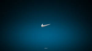 白色Nike Swoosh標誌在藍色漸變背景上，帶有'just do it'文字。