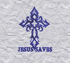 在帶紋理的白色紙張上，一個藍色華麗十字架和文字 Jesus Saves。 — 耶穌基督 壁紙