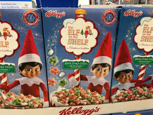 Kellogg's Elf on the Shelf穀物盒，精靈拿著星形穀物和棉花糖。