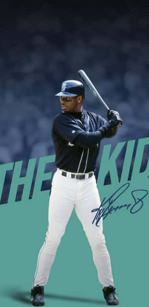 身穿海軍藍和白色球衣的棒球手處於打擊姿勢，帶有「THE KID」文字和簽名。