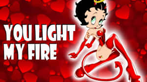 Betty Boop 穿著魔鬼服裝，配上紅色心形和文字「你點燃了我的火」。 — 可愛聖誕風格 壁紙