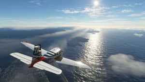 小型飛機飛越海洋，島嶼和陽光反射 — 16:9 壁紙