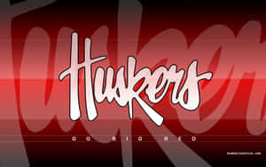 Huskers 團隊標誌桌布，帶有紅色漸變背景和 GO BIG RED 標語