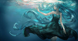 水中穿著青綠色連衣裙的長藍發動漫女孩 — 初音未來 壁紙