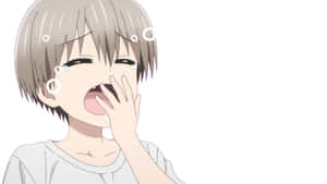 動漫男孩笑著，淚水和泡泡漂浮在臉龐周圍。