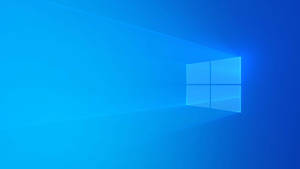 Windows 標誌在藍色漸變背景上發光