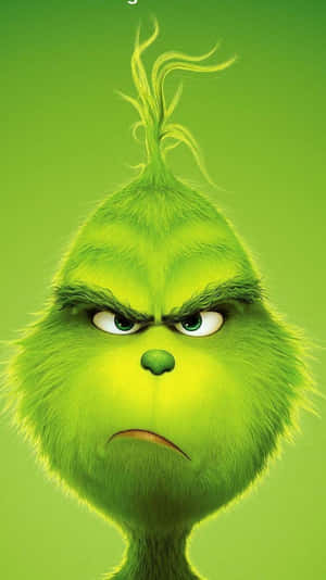 Grinch 表情繃緊，綠色毛髮。