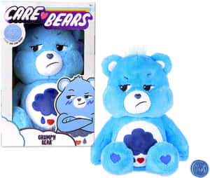 藍色毛絨Grumpy Bear玩具，帶有皺眉表情和雲朵標誌，旁邊是其品牌盒子。