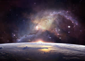 行星地平線，日出，上方有螺旋星系