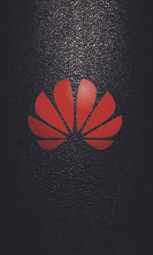 帶有淺色漸變的紋理黑色背景上的紅色華為標誌。 — Huawei 壁紙