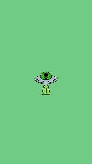 一個帶有綠色外星人頭部的卡通UFO漂浮在綠色背景上。 — Alienware GIF 壁紙