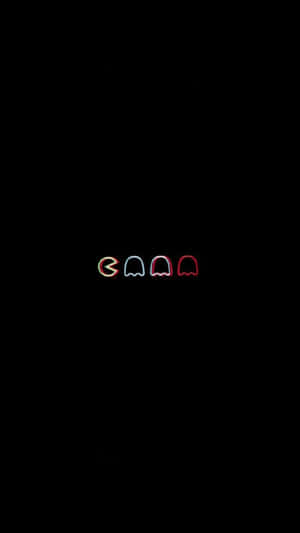 四個發光的 Pac-Man 鬼魂，以霓虹色呈現，黑色背景。