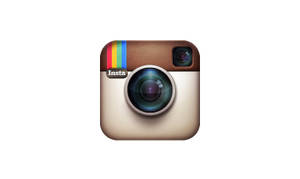 Instagram 應用程式標誌，特色是帶有彩虹條紋的復古相機。