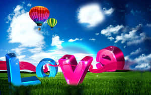 閃亮的3D字母在草地上拼出「Love」，背景是明亮的藍天和熱氣球。 — 愛戀風格 壁紙