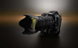 專業Nikon D810相機配備遠攝鏡頭，在影樓燈光下置於反光表面。