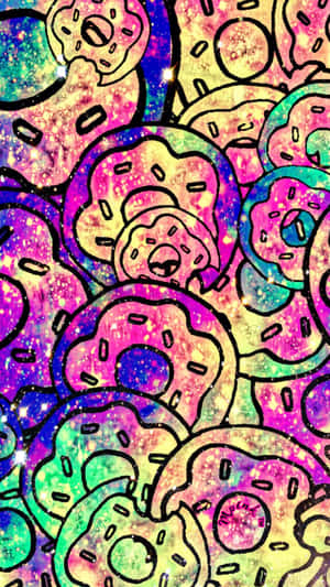 色彩繽紛的卡通甜甜圈，搭配閃爍的銀河背景。 — 萌 壁紙