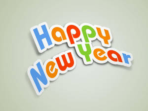 以白色邊框的俏皮多彩字母組成的Happy New Year文字。