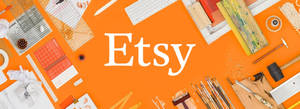 Etsy 標誌被手工工具和藝術用品包圍在橙色背景上。