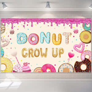 彩色卡通甜甜圈壁畫，磚牆上寫有 'DONUT GROW UP' 文字。 — 冬甩 壁紙