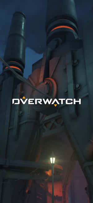 夜間未來工業建築上的遊戲標誌Overwatch。 — 鬥陣特攻 GIF 壁紙