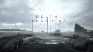暴風雨海灘上擱淺的鯨魚，標題 Death Stranding 懸浮在上方。 — 1920x1080 壁紙