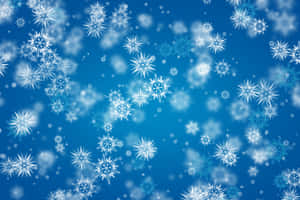 雪花在藍色冬日天空中飄落 — 圖案 壁紙