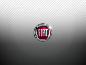 Fiat標誌徽章，位於帶有對角線條紋的金屬灰色背景上。