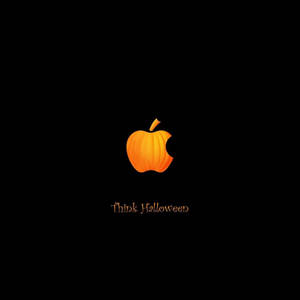 發光橙色南瓜標誌，帶有「Think Halloween」文字，黑色背景。