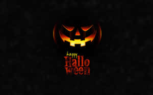 發光南瓜燈在深色背景上配有happy halloween文字