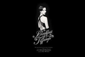 身穿黑色裙的女性轉頭回眸，帶有「Breakfast at Tiffany's」文字。