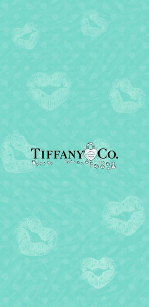 Tiffany Co 標誌被模糊的唇印環繞，位於青綠色背景上。