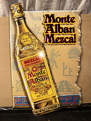 帶有墨西哥文化圖案的復古Monte Alban Mezcal酒瓶插圖。