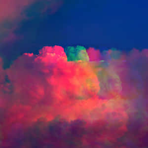 超現實的霓虹雲在深藍色天空背景下發出粉紅、綠色和紫色的光芒。 — 淺粉紅色美學動圖 壁紙